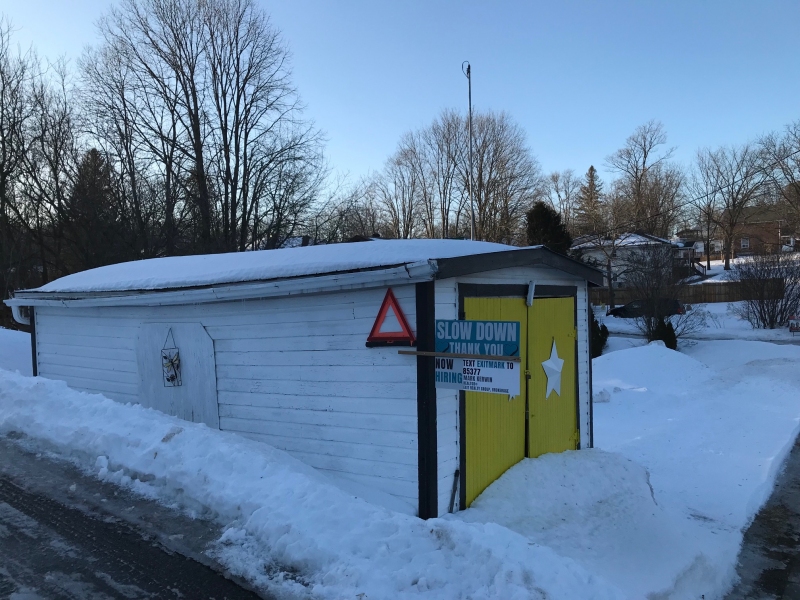 Small garage by road